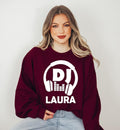 Stand out with this personalised DJ sweatshirt featuring your custom DJ name and bold headphones design. The soft premium fabric, relaxed unisex fit and professional print make it the perfect sweatshirt for DJs, performers and music lovers. Every sweatshirt is made to order and professionally printed in the UK by TeezoraPrints for a premium finish.
