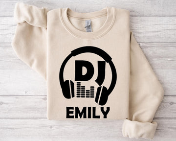 Perfect for DJs, music producers, festival performers and electronic music enthusiasts, this personalised DJ sweatshirt features a bold headphones graphic with your custom DJ name for a professional look. Ideal for gigs, studio sessions and everyday wear, every premium sweatshirt is professionally printed in the UK by TeezoraPrints using high-quality materials for warmth and comfort.