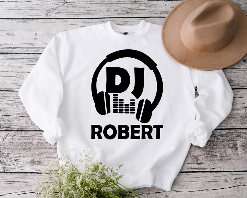 Searching for the perfect gift for a DJ? This personalised DJ sweatshirt is a thoughtful gift for birthdays, Christmas, Father's Day, Mother's Day or special celebrations. Featuring a custom DJ name with stylish headphones artwork, every premium sweatshirt is professionally printed in the UK by TeezoraPrints for a memorable personalised gift.