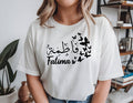 Personalised Arabic Name Butterfly T Shirt featuring premium quality printing, elegant Arabic calligraphy, and beautiful butterfly artwork. Designed to create a meaningful keepsake while offering comfort, style, and individuality, this personalised shirt makes a thoughtful gift for loved ones who appreciate Arabic fashion, Islamic clothing, and personalised custom apparel.