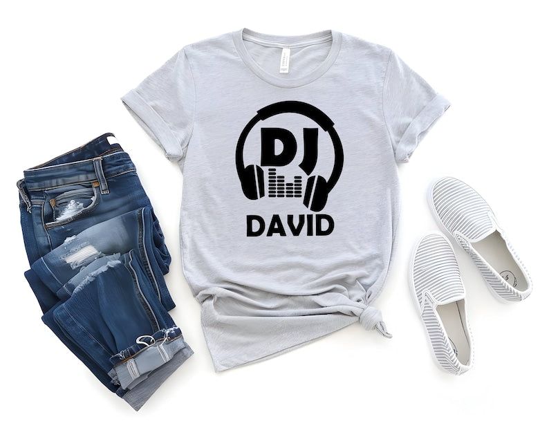 Comfortable personalised DJ t shirt suitable for music festivals, club events, performances, parties, travelling, casual outings and everyday wear. The stylish custom design allows wearers to showcase their love for music while enjoying a soft and durable t shirt built for long-lasting comfort.