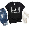Beautiful personalised Arabic name t shirt created as a thoughtful gift for wives, daughters, sisters, mothers, friends and loved ones. Featuring a custom Arabic calligraphy design printed in gold on a black t shirt, this meaningful personalised gift is perfect for Eid, Ramadan, birthdays, anniversaries and celebrations. A unique present that combines fashion, culture and personal identity in one elegant garment.