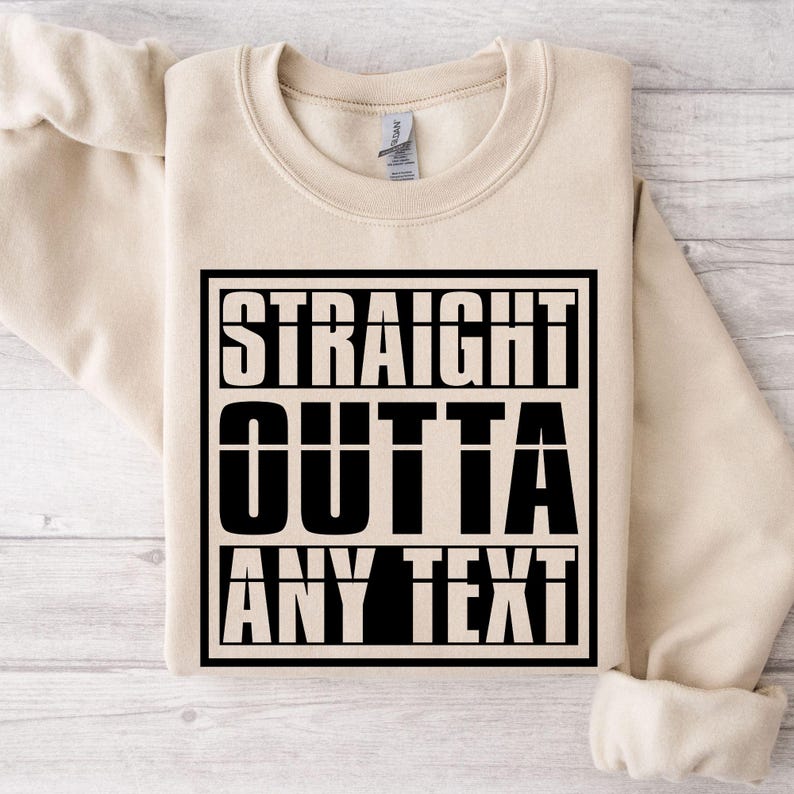 Personalised Straight Outta sweatshirt featuring a bold custom location typography design printed on a premium unisex crewneck sweatshirt. Personalise this custom jumper with any city, town, village, country, workplace, school, university, nickname, or custom wording to create a unique statement piece. Comfortable, stylish, and professionally printed for everyday wear and personalised fashion lovers.