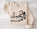 Personalised Arabic Calligraphy Sweatshirt designed with elegant butterfly artwork and custom Arabic typography, creating a unique and meaningful personalised clothing piece. Perfect for Eid gifts, Ramadan presents, birthdays, anniversaries, Christmas gifting, and special family occasions. Combining premium comfort, modest fashion styling, Islamic-inspired design, and personalised Arabic calligraphy, this sweatshirt is a thoughtful gift choice for Muslim women who appreciate meaningful and stylish apparel.