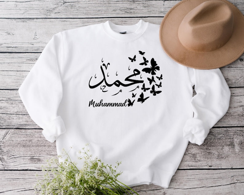Personalised Arabic Calligraphy Sweatshirt featuring butterfly design artwork, custom Arabic name, Islamic clothing, Muslim women fashion, Eid gift idea, Ramadan present, personalised Islamic apparel, Arabic typography clothing, faith inspired fashion, custom sweatshirt, modest wear, personalised gift, Muslim gift, elegant Arabic calligraphy sweatshirt designed for stylish everyday wear and special occasions.