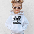 Create a unique personalised Kids DJ Hoodie by adding your child's custom DJ name above the stylish controller design. An ideal gift for boys and girls who enjoy music, dancing and performing. Great for birthdays, Christmas, special occasions and everyday outfits. Every hoodie is made to order and professionally printed in the UK by TeezoraPrints for premium quality and lasting comfort.