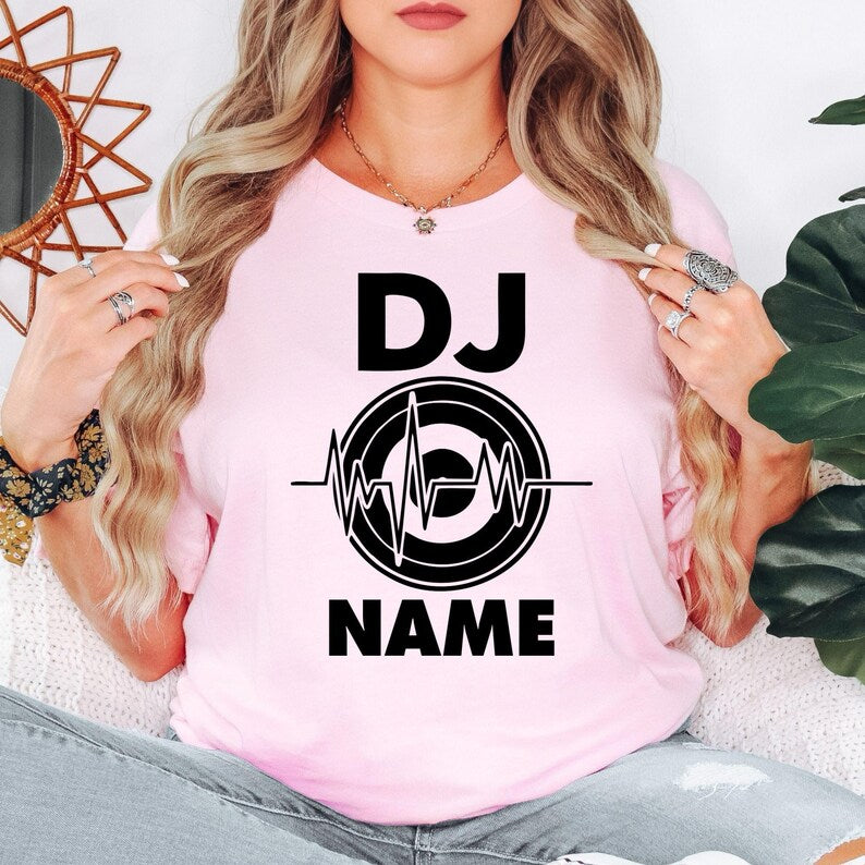 Custom DJ shirt designed for DJs, music producers, nightclub entertainers, EDM artists and festival performers. Perfect for gigs, rehearsals, studio sessions, music festivals and casual everyday wear. Every premium graphic t-shirt is professionally printed in the UK by TeezoraPrints, offering outstanding comfort and vibrant print quality.