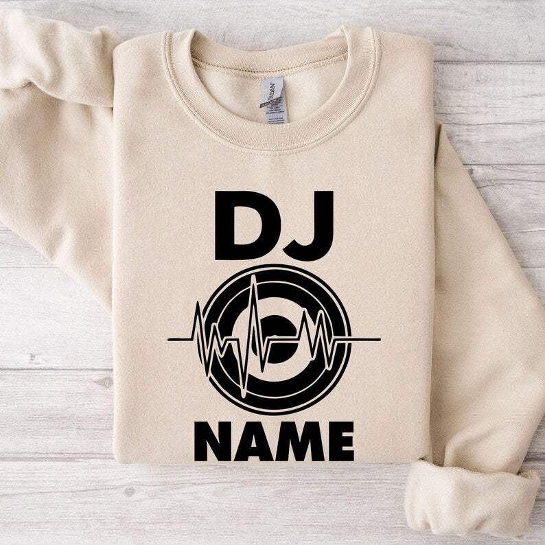 Looking for a unique gift for a DJ or music producer? This personalised sweatshirt makes a thoughtful present for birthdays, Christmas, Father's Day, Mother's Day and special celebrations. Featuring your custom DJ name with a heartbeat design, every sweatshirt is professionally printed in the UK by TeezoraPrints.
