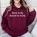 Show everyone where your passion really belongs with this Born To DJ. Forced To Work. Hoodie. Designed with a clean statement quote and crafted from soft premium fabric, it's ideal for DJs, producers and electronic music fans who love stylish, comfortable apparel. Perfect for club nights, festivals, travelling or relaxing between performances. Every hoodie is professionally printed in the UK by TeezoraPrints.