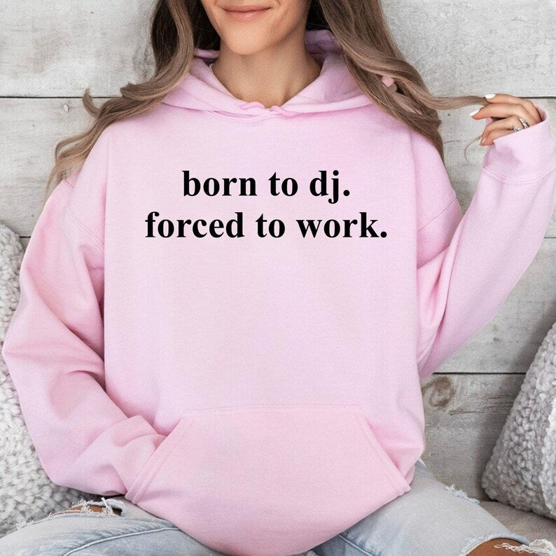 Featuring a clean typography layout with the humorous Born To DJ. Forced To Work. quote, this premium hoodie delivers a timeless statement look for DJs and electronic music enthusiasts. Easy to pair with jeans, joggers or casual outfits, every hoodie is professionally printed in the UK by TeezoraPrints using premium printing techniques for long-lasting quality.