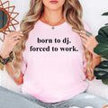 Perfect for DJ gigs, nightclub events, music festivals, rehearsal sessions, recording studios, bachelor parties, concerts, weekend outings, holidays and casual everyday wear. This humorous Born To DJ Forced To Work t-shirt combines premium comfort with a fun music-inspired design that stands out wherever you go. Every order is professionally printed in the UK by TeezoraPrints using durable, high-quality printing methods.