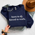 Funny DJ sweatshirt, Born To DJ Forced To Work jumper, DJ quote crewneck, music producer sweatshirt, disc jockey apparel, EDM clothing, electronic music fashion, club DJ outfit, festival sweatshirt, rave clothing, novelty music gift and premium statement apparel. Every premium sweatshirt is proudly printed in the UK by TeezoraPrints for everyday comfort and lasting quality.