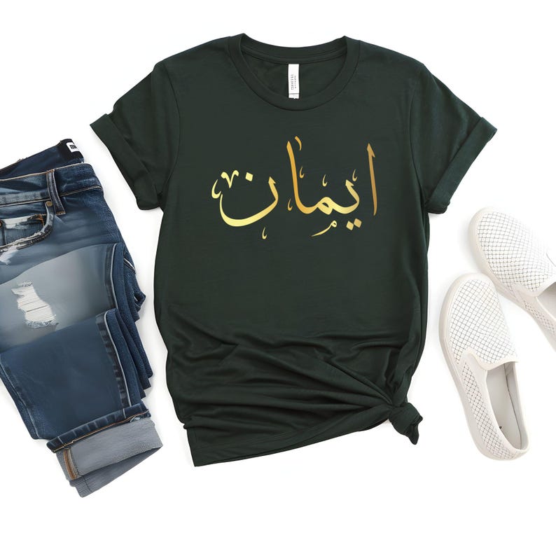 Personalised Arabic Name T Shirt combines modern Arabic typography, personalised fashion, and everyday comfort in one stylish garment. Perfect for casual streetwear, modest fashion styling, travel outfits, family gatherings, social occasions, shopping trips, coffee dates, and daily wear. This premium personalised t shirt celebrates culture, identity, and individuality through elegant Arabic calligraphy and contemporary fashion design.