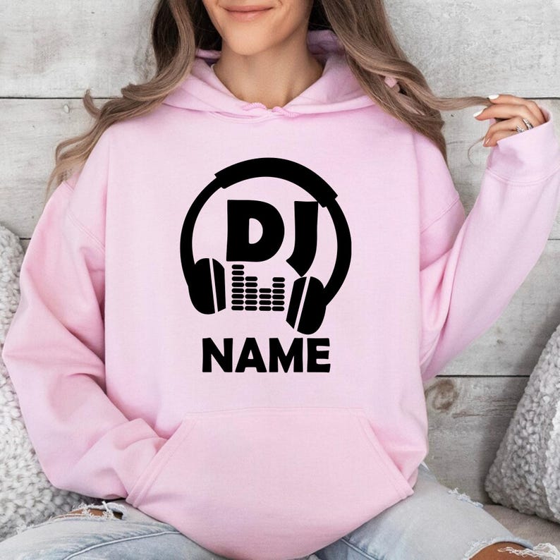 Perfect for DJ performances, music festivals, recording studios, club nights, rehearsal sessions, private events, travel days and everyday wear. This personalised DJ hoodie combines warmth, comfort and professional style, while every order is professionally printed in the UK by TeezoraPrints using premium-quality materials.