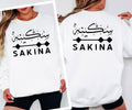 Personalised Arabic Name Sweatshirt celebrating faith, identity, culture, and personal expression through beautiful Arabic calligraphy. Featuring your chosen Arabic name printed on a premium sweatshirt, this meaningful design creates a lasting keepsake while combining modest fashion, individuality, comfort, and cultural pride in a stylish personalised clothing piece designed for everyday wear.