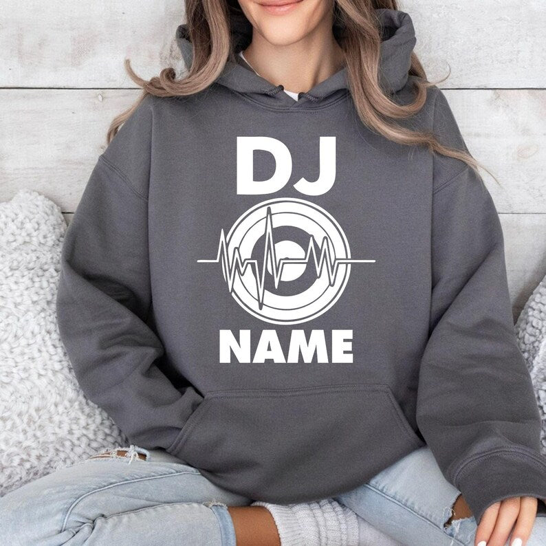 Custom DJ hoodie designed for DJs, producers, EDM artists, nightclub entertainers and festival performers. Perfect for live shows, rehearsals, studio sessions, music festivals and casual outfits. Every premium hoodie is professionally printed in the UK by TeezoraPrints for comfort and vibrant print quality.