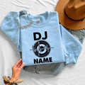 Create a one-of-a-kind personalised DJ sweatshirt by adding your own DJ name beneath the heartbeat turntable artwork. Perfect for professional DJs, beginners, producers and entertainers wanting custom apparel. Every sweatshirt is made to order and professionally printed in the UK by TeezoraPrints with exceptional attention to detail.