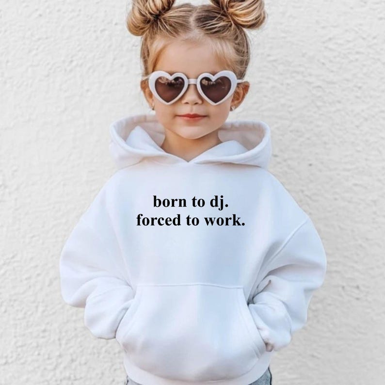 Searching for a memorable gift for a DJ or music producer? This Born To DJ. Forced To Work. Hoodie makes a brilliant birthday, Christmas, Father's Day or Mother's Day gift for anyone passionate about electronic music. The humorous quote makes it a standout present that's both practical and entertaining. Every hoodie is professionally printed in the UK by TeezoraPrints using premium materials.