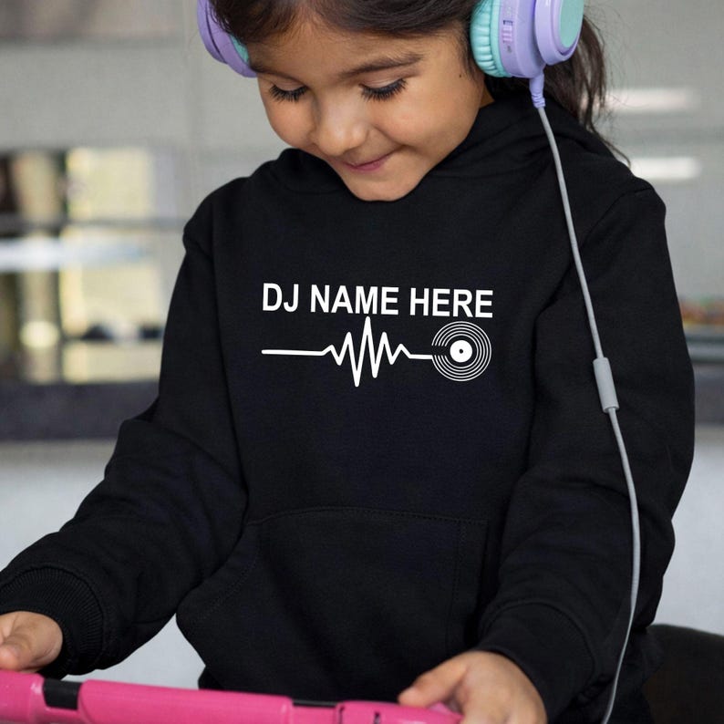 Looking for the perfect personalised gift for a DJ? This DJ Name Heartbeat Hoodie can be customised with any name and makes an ideal birthday, Christmas or special occasion gift for DJs, producers and vinyl music lovers. Professionally printed in the UK by TeezoraPrints.