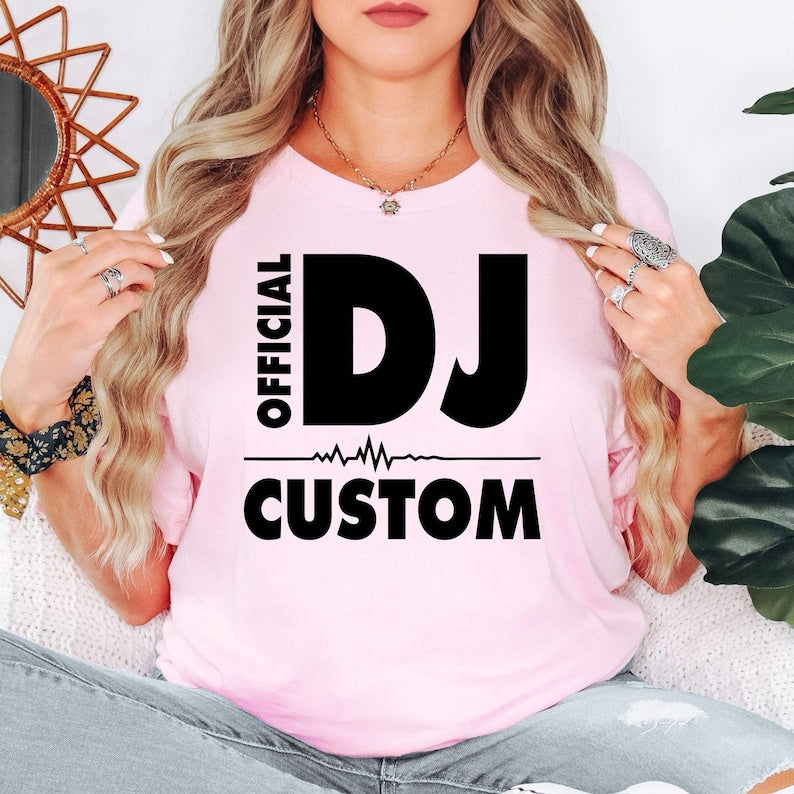 Perfect for DJ gigs, club nights, music festivals, birthday celebrations, studio sessions, concerts, parties and casual everyday wear. This personalised Official DJ T-Shirt combines premium comfort with a bold custom design, professionally printed in the UK by TeezoraPrints for outstanding quality.