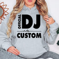 Designed for DJs, remix artists, music producers, club performers and electronic music lovers, this personalised Official DJ Heartbeat Hoodie celebrates DJ culture with bold typography, a heartbeat waveform and a custom name. Every premium hoodie is professionally printed in the UK by TeezoraPrints for exceptional comfort, durability and standout style.