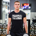 Personal Trainer T Shirt created for certified personal trainers, fitness coaches, gym instructors, strength coaches, wellness professionals, bodybuilding enthusiasts, gym owners, and fitness lovers who inspire others every day. Featuring bold retro typography, this premium graphic tee from Teezora Prints combines exceptional comfort, premium print quality, and stylish athletic fashion, making it ideal for professionals working in gyms, fitness studios, boot camps, and personal training sessions.
