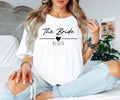 Comfortable personalised bridal party shirts suitable for hen weekends, wedding planning events, bridal showers, destination weddings, wedding preparation mornings and casual celebrations. These matching t shirts help create beautiful photographs while keeping the bridal party comfortable throughout the festivities.