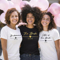 Custom bridal party t shirts personalised with individual names and wedding roles. Customers can choose titles such as Bride, Bridesmaid, Maid of Honour, Sister of the Bride, Mother of the Bride and Bride Squad. A personalised wedding clothing option designed to make every member of the bridal party feel special.