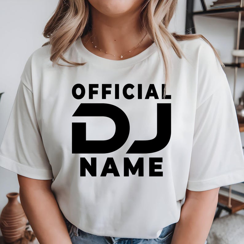 Custom Official DJ shirt for DJs, nightclub performers, music producers, festival artists and entertainment professionals. Perfect for live gigs, recording studios, private events, club performances and music festivals. Every premium graphic t-shirt is professionally printed in the UK by TeezoraPrints for outstanding comfort and vibrant print quality.