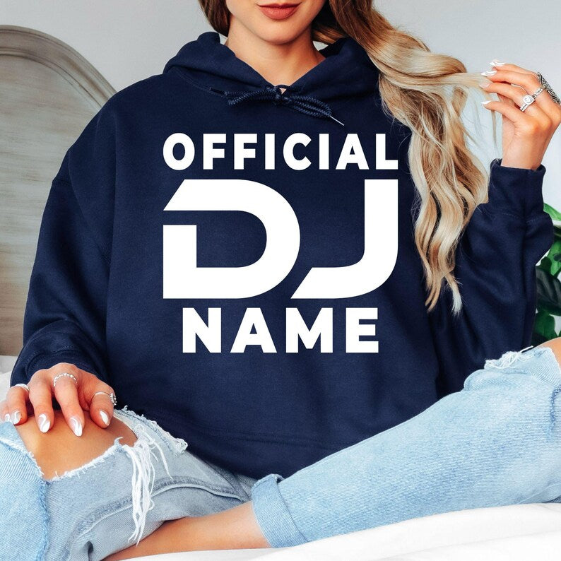 Personalised Official DJ hoodie, custom DJ name hoodie, DJ pullover hoodie, music producer hoodie, disc jockey apparel, EDM clothing, festival hoodie, custom music hoodie, professional DJ outfit and premium winter hoodie. Every premium hoodie is proudly printed in the UK by TeezoraPrints for comfort and exceptional quality.