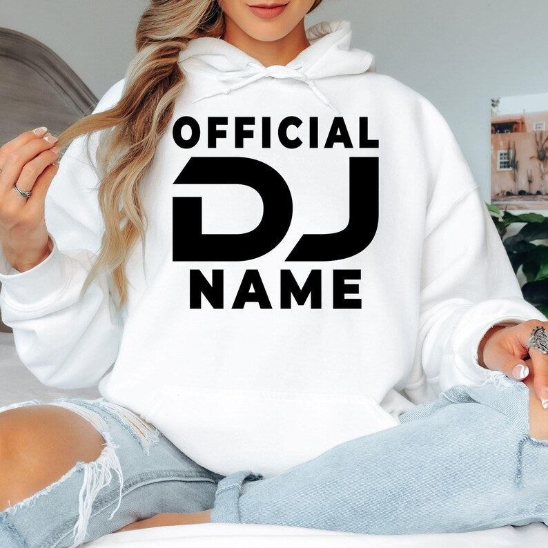 Personalised Official DJ hoodie featuring a custom DJ name and bold typography for DJs, music producers, club performers and festival artists. Perfect for music festivals, nightclub events, studio sessions and everyday wear. Every premium hoodie is professionally printed in the UK by TeezoraPrints with vibrant colours and long-lasting print quality.
