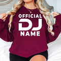 Custom Official DJ sweatshirt designed for DJs, music producers, nightclub entertainers, EDM artists and festival performers. Perfect for studio recording, club nights, rehearsals, music festivals and everyday outfits. Every premium crewneck sweatshirt is professionally printed in the UK by TeezoraPrints, delivering warmth, comfort and outstanding print quality.