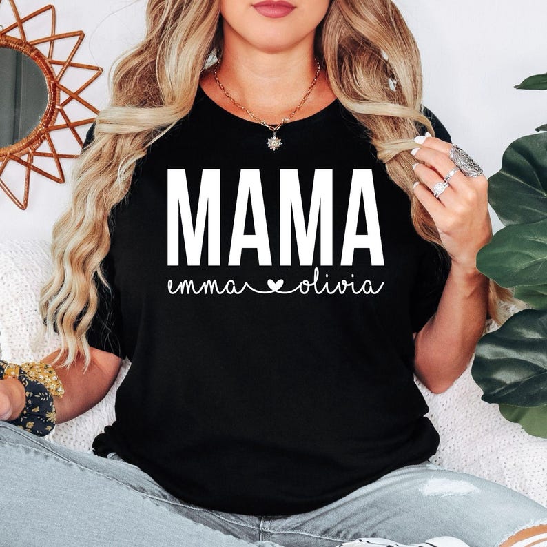 Personalised Mama T Shirt created for mums, new mums, mothers, wives, grandmothers, mums-to-be, and proud women celebrating motherhood. Featuring a custom children’s names design beneath the bold MAMA typography with a heart detail, this premium Mother's Day gift from Teezora Prints offers exceptional comfort, premium print quality, and timeless everyday fashion for every proud mum.