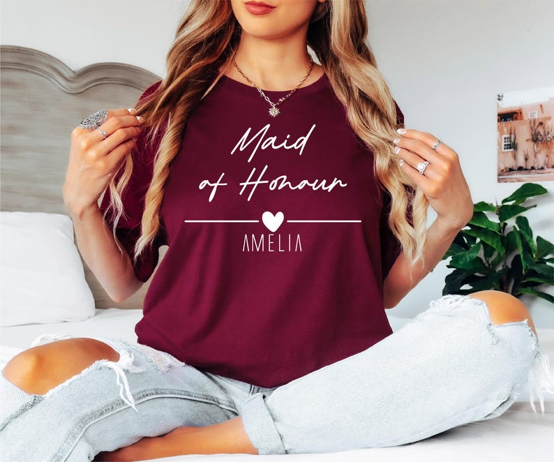 Stylish bridal party t shirts featuring elegant typography, personalised names and modern wedding-inspired designs. These matching wedding shirts pair perfectly with jeans, leggings, shorts and casual outfits while creating a coordinated and fashionable look for bridal party celebrations and special occasions.