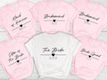 Personalised bridesmaid shirts designed as thoughtful gifts for bridesmaids, maid of honour, bride squad members and wedding party participants. Perfect for bridesmaid proposals, bridal showers, wedding mornings, Christmas gifts and special wedding celebrations. A meaningful keepsake that combines style, comfort and personalisation.