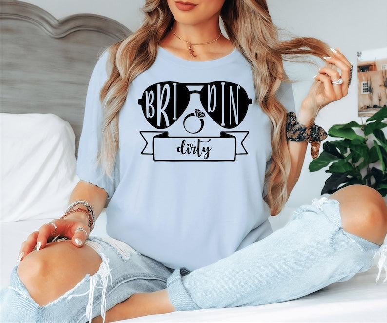 Bride Squad Matching Bachelorette T Shirts are perfect for hen parties, bridal showers, wedding mornings, girls' trips, destination weddings, spa days, brunch dates, engagement celebrations, rehearsal dinners, family gatherings, holiday weekends, and memorable group photos. Teezora Prints combines premium print quality with stylish bridal designs to create coordinated outfits for every wedding celebration.