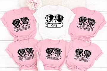Bride Squad Matching Bachelorette T Shirts created for brides, bridesmaids, maid of honour, bridal party members, and best friends celebrating unforgettable wedding moments together. Featuring the fun "They See Us Rollin' We Celebratin'" design alongside a personalised Bride shirt, this premium matching collection from Teezora Prints is perfect for hen parties, bridal showers, girls' weekends, wedding mornings, group photos, and stylish bridal celebrations with matching outfits.