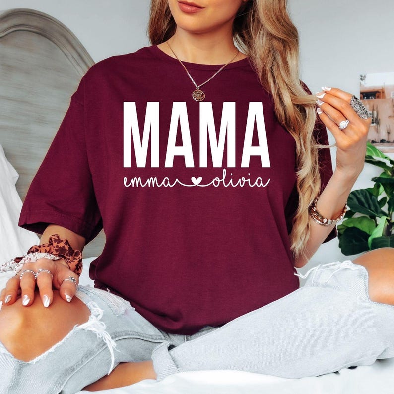 Personalised Mama T Shirt makes a thoughtful gift for mums, mothers, wives, grandmothers, stepmums, new mums, expecting mums, daughters, sisters, and loved ones celebrating motherhood. Designed by Teezora Prints, this premium personalised shirt is perfect for Mother's Day, birthdays, Christmas, baby showers, pregnancy announcements, push presents, family celebrations, and unforgettable personalised gifts.