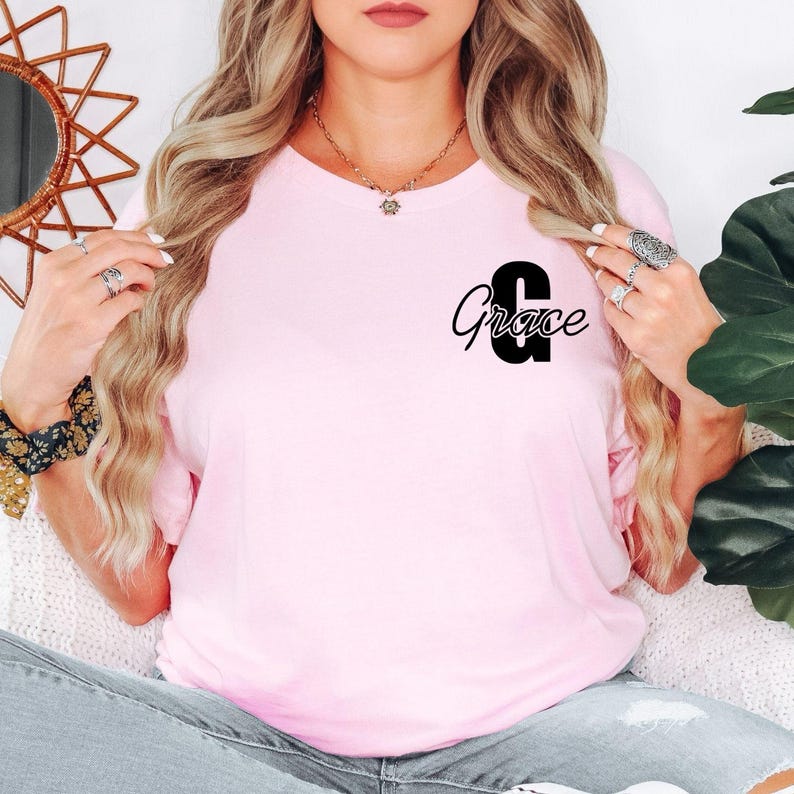 Unisex personalised initial t shirt suitable for women, men, teenagers, students, mums, daughters, bridesmaids, best friends and family members. The custom monogram design appeals to anyone looking for personalised clothing that reflects their identity while maintaining a modern and stylish fashion appearance.