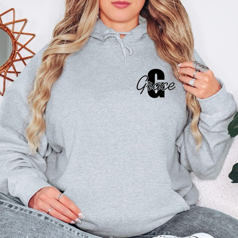 Unisex personalised hoodie suitable for women, men, teenagers, students, mums, daughters, bridesmaids, friends and family members. The custom initial and name design appeals to anyone looking for personalised clothing that combines stylish fashion with individual identity and meaningful personalisation.