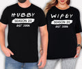 Personalised Hubby Wifey Family Matching T Shirts featuring custom names, personalised season number, custom established year, matching couple design, family matching apparel, premium printed clothing, romantic couple outfits, and casual everyday fashion. Teezora Prints creates premium matching shirts for customers searching personalised family matching tees, custom husband wife shirts, anniversary matching outfits, wedding gifts, and personalised couple apparel.