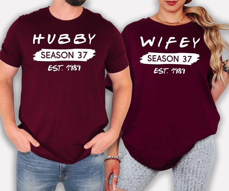 Personalised Hubby Wifey Family Matching T Shirts make a meaningful gift for husbands, wives, couples, newlyweds, parents, families, best friends, and loved ones celebrating weddings, anniversaries, engagements, or family milestones. Designed by Teezora Prints, this premium matching Family Tee can be personalised with your own details, making it perfect for Christmas, Valentine's Day, birthdays, anniversaries, and unforgettable personalised gifts.