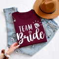 Perfect for hen parties, bridal showers, bachelorette weekends, wedding mornings, engagement celebrations, bridal brunches, girls' trips, rehearsal dinners and wedding photoshoots. This Team Bride shirt creates coordinated bridal party outfits with premium comfort, while TeezoraPrints ensures every order is professionally printed in the UK.