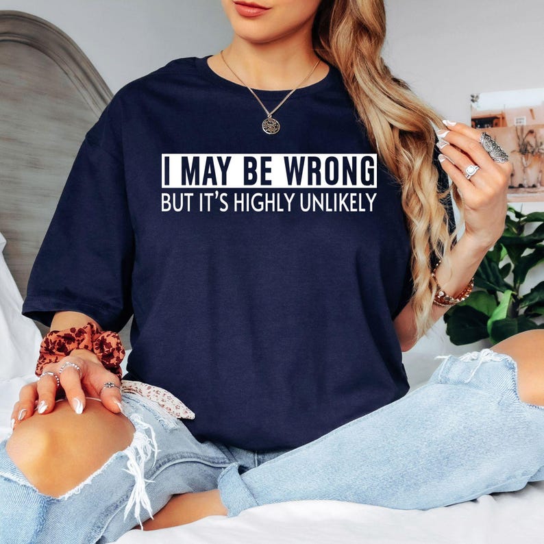 Searching for a funny gift guaranteed to get laughs? This "I May Be Wrong But It's Highly Unlikely" t shirt features a bold typography design that instantly stands out. Professionally printed on a premium quality tee, it offers comfort, durability, and timeless style. Perfect for birthdays, Christmas, Father's Day, Mother's Day, office parties, family gatherings, or anyone with a confident personality and brilliant sense of humour.