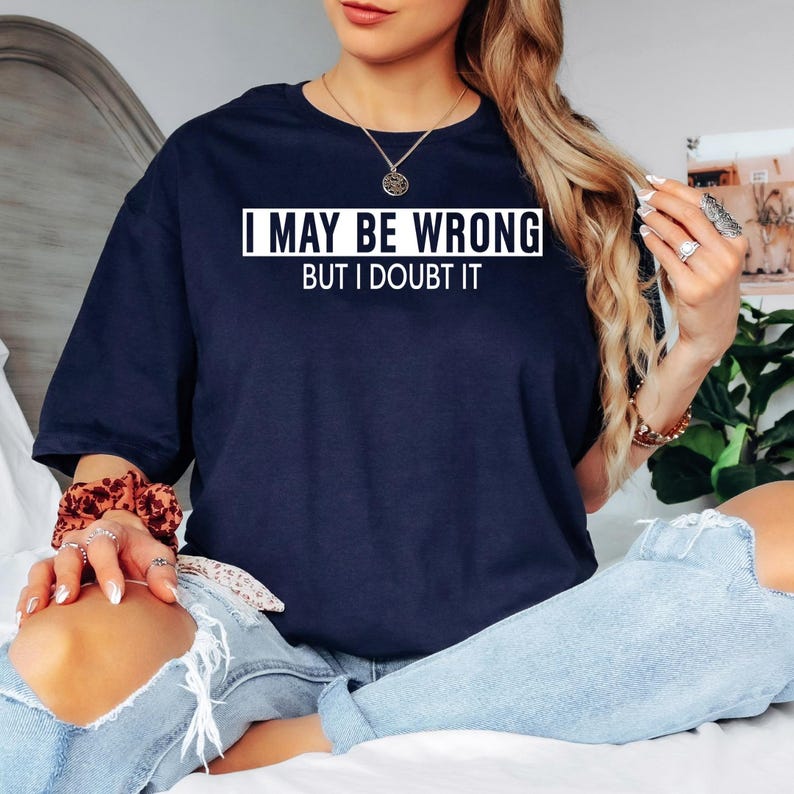 Searching for a funny gift guaranteed to make everyone smile? This "I May Be Wrong But I Doubt It" t shirt features a bold typography design that instantly grabs attention. Professionally printed on a premium quality t shirt, it offers comfort, durability, and timeless style. Perfect for birthdays, Christmas, Father's Day, Mother's Day, office parties, family gatherings, or anyone with a witty personality who loves sarcastic humour and clever jokes.