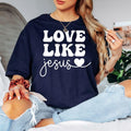 Searching for a meaningful Christian gift? This Love Like Jesus t shirt features a beautiful faith-inspired typography design that shares a powerful message of kindness and compassion. Professionally printed on a premium quality t shirt, it provides lasting comfort and style. Perfect for birthdays, Mother's Day, Christmas, baptisms, Easter, church events, Bible study groups, and thoughtful gifts for believers.