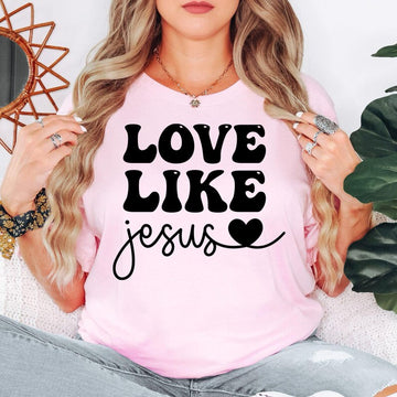 Love Like Jesus Christian t shirt designed for men and women who proudly live their Christian faith and enjoy inspirational Bible-based clothing. Featuring a bold "Love Like Jesus" message with a stylish typography design, this premium graphic tee is perfect for believers, church members, worship leaders, Bible study groups, youth ministries, pastors, family members, and anyone who wants to share God's love through meaningful Christian apparel.