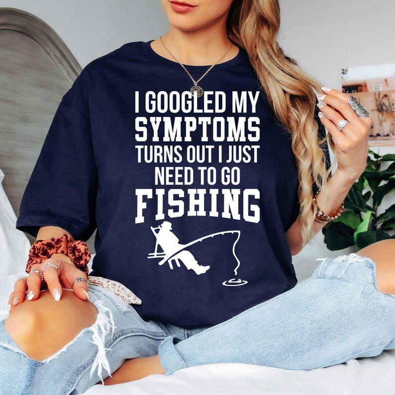 Searching for the perfect gift for a fisherman? This "I Googled My Symptoms Turns Out I Just Need To Go Fishing" t shirt features a funny fishing quote and eye-catching graphic that every angler will appreciate. Professionally printed on a premium quality t shirt, it offers exceptional comfort and durability. Perfect for birthdays, Father's Day, Christmas, fishing holidays, camping trips, and weekend adventures.