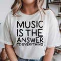 Music Is The Answer To Everything T Shirt featuring an inspirational music quote, music lover typography design, musician apparel, music teacher shirt, band clothing, concert fashion, choir apparel, premium printed graphic tee, and casual everyday wear. Perfect for customers searching music lover shirts, musician gifts, music teacher t shirts, band apparel, concert clothing, inspirational music fashion, and graphic music tees.