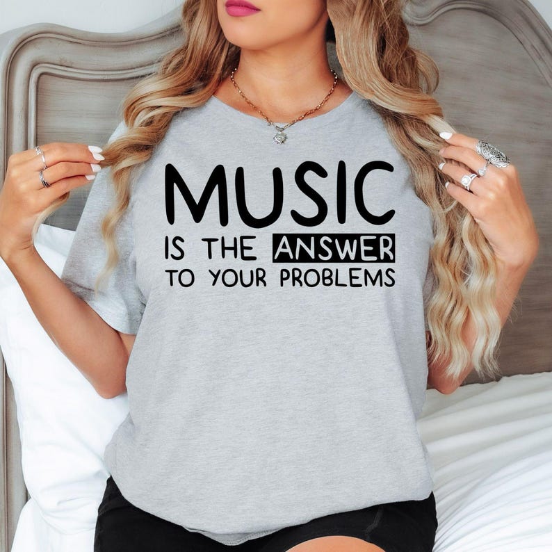 Music Is The Answer To Your Problems t shirt is perfect for concerts, music festivals, choir rehearsals, orchestra practice, recording sessions, school music lessons, church worship, band performances, family gatherings, birthdays, holidays, casual everyday wear, music competitions, studio sessions, weekend outings, and social events. The bold typography design creates an inspiring conversation starter while celebrating creativity, passion, positivity, and a lifelong love of music.